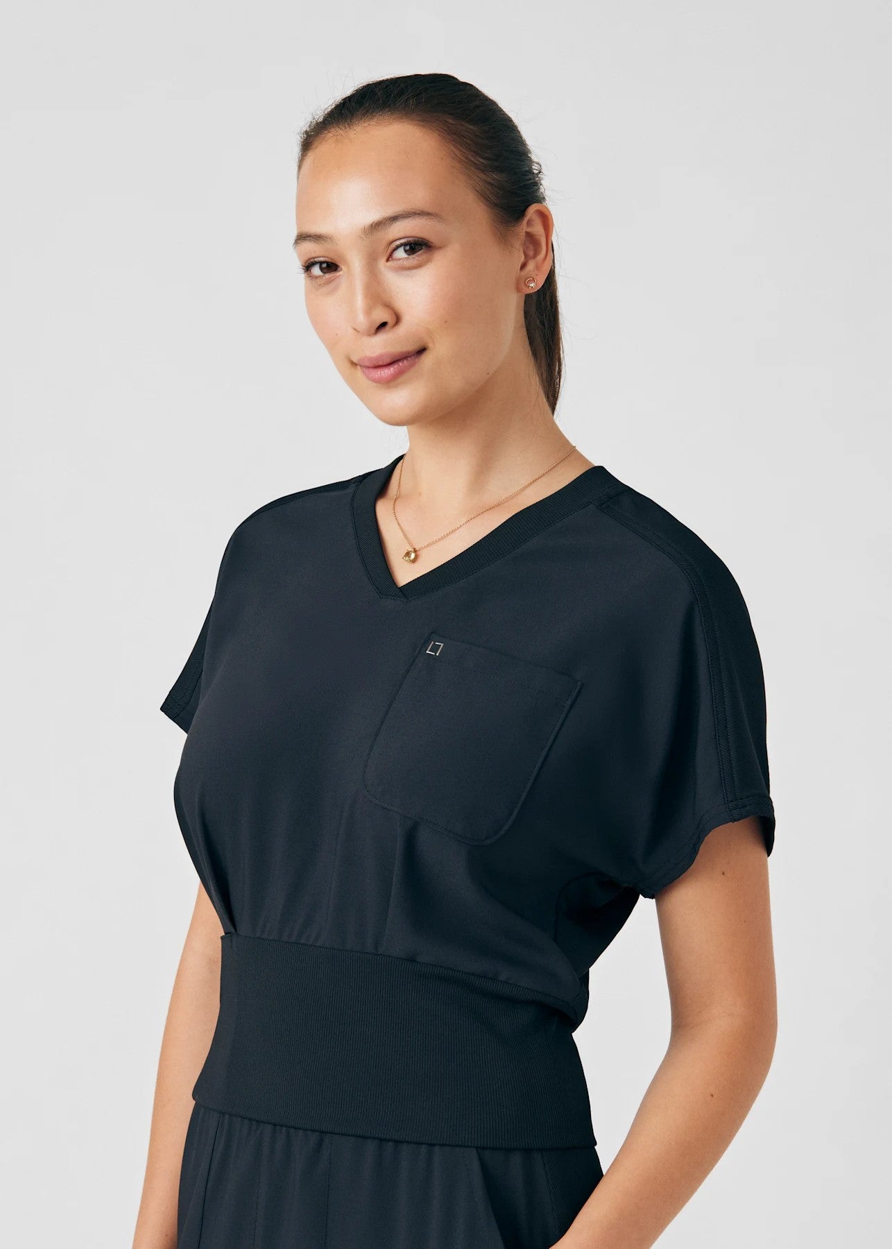 LANDAU FORWARD KNIT WAISTED TUCKABLE TOP 50% OFF